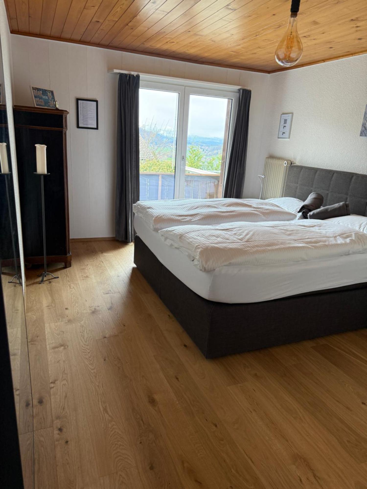 Eva'S Seeblick Krattigen Habitación foto