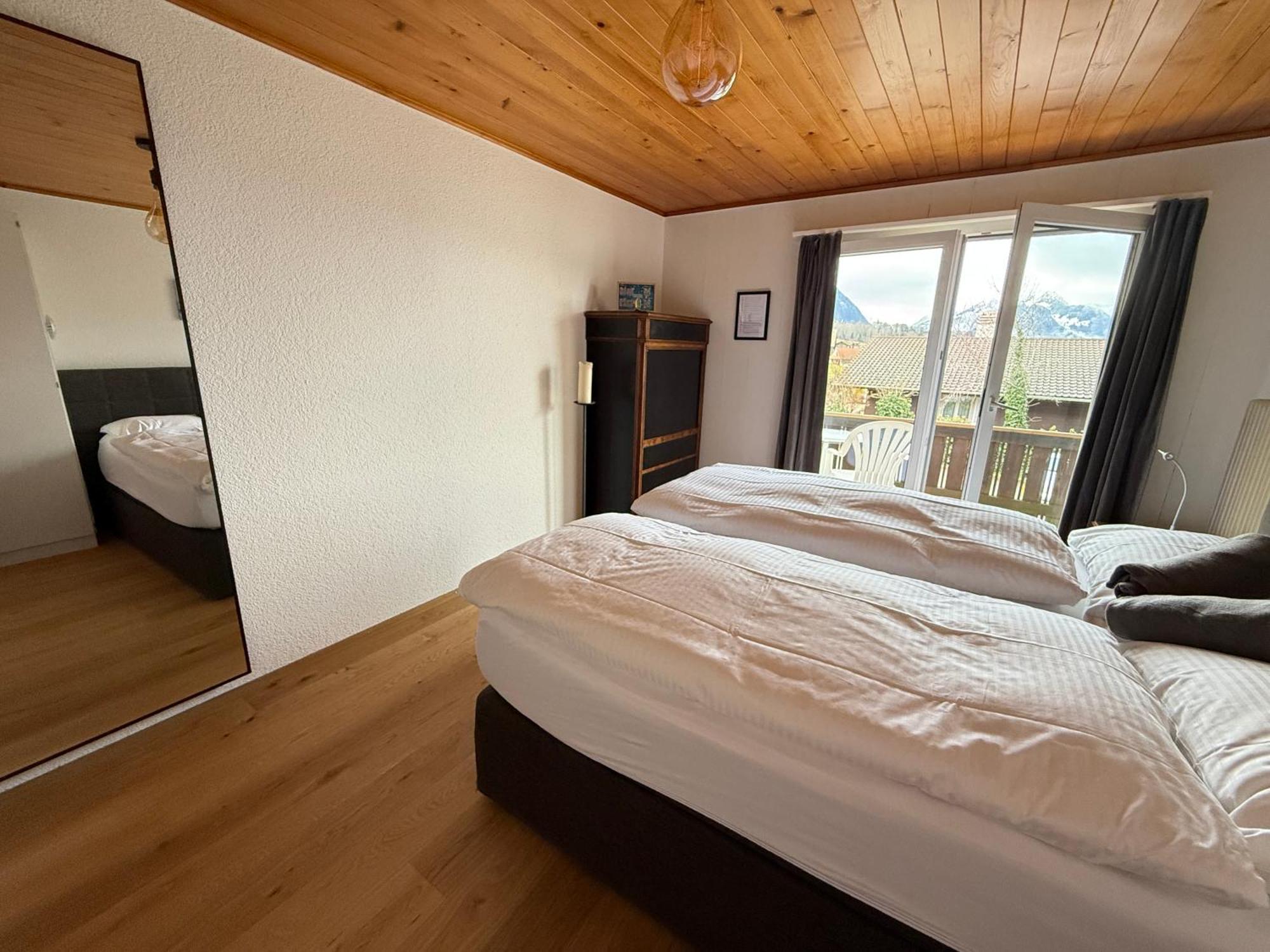 Eva'S Seeblick Krattigen Habitación foto