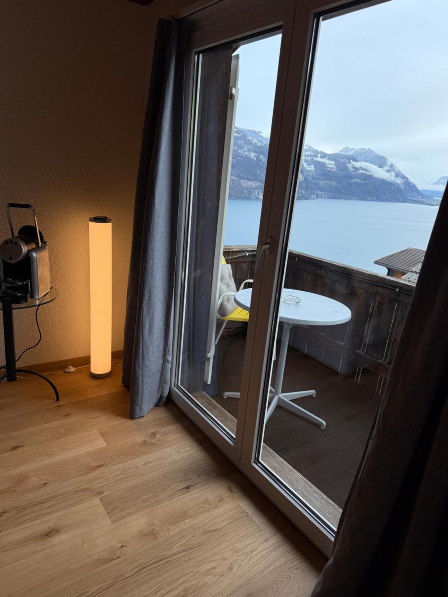Eva'S Seeblick Krattigen Habitación foto