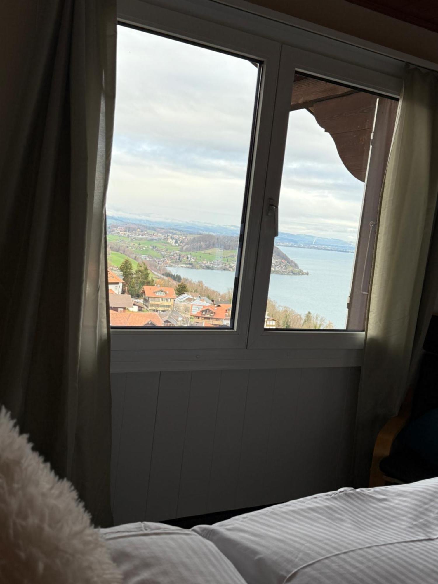 Eva'S Seeblick Krattigen Habitación foto